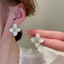 Flores Ohrringe